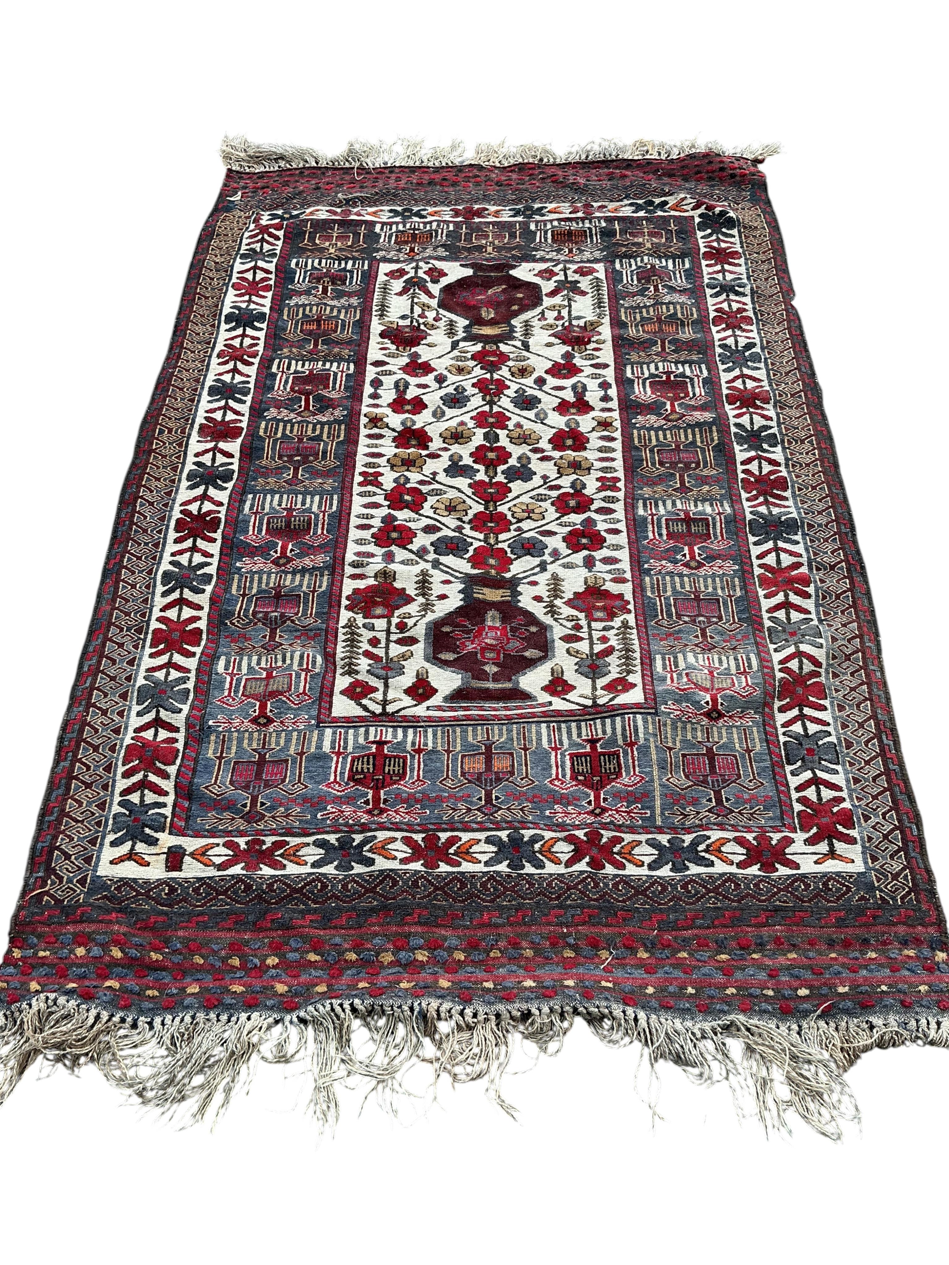 A Turkish polychrome flatweave carpet, approx. 220 x 140cm